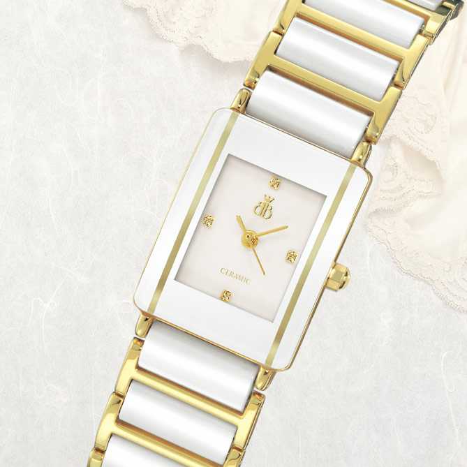 Reloj Eternal: Esfera: Madreperla con cristales en los cuartos, protegida por un cristal de zafiro irrayable