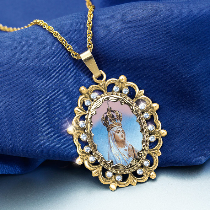 MEDALLA DE NUESTRA SEÑORA DE FÁTIMA: Medalla y cadena acabadas en oro de Primera Ley